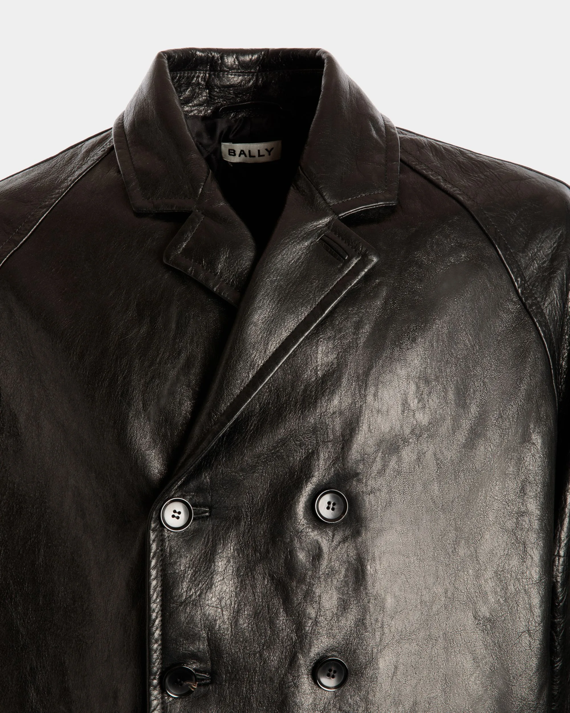 Double-breasted Coat In Black Leather